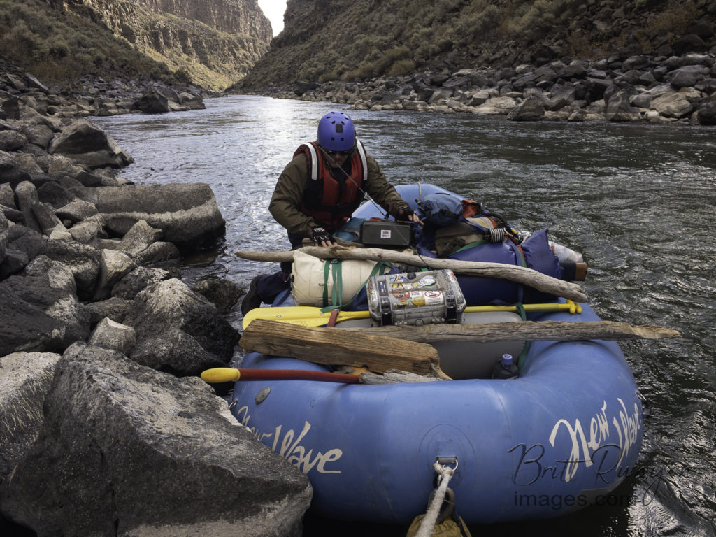 Collecting firewood for the night on the river.