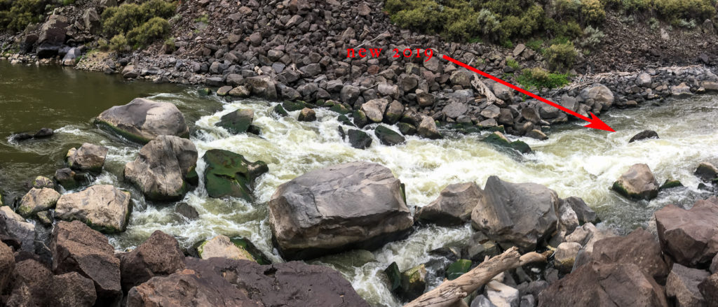 Powerline Rapid on the final day showing the new boulder.